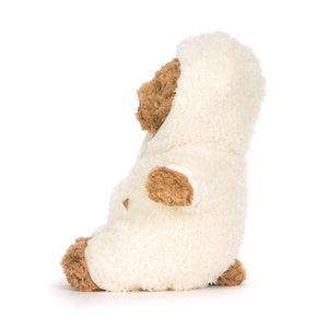 Side view of a Jellycat brown bear plush wearing a white fleece all in one outfit on a white background. 