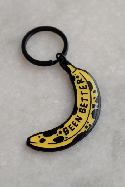 black keychain with a browning banana with the text "been better" on the peel 