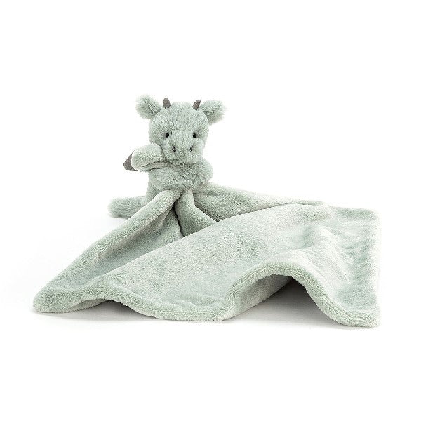 adorably soft light green dragon soother hugging a blanket of the same colour by popular brand Jellycat.