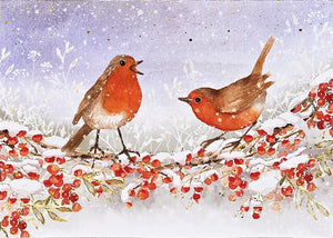 Card showing image of two robins on a branch with red berries against a snowy background