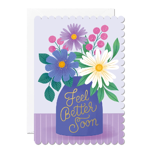 lilac feel better card with rounded, hill-like sides. purple, pink, white, and indigo flowers are in a purple vase. golden text on it reads "feel better soon"