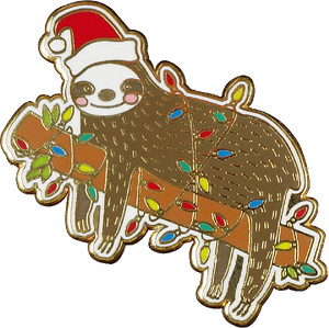 white cut-shape enamel pin of a smiling sloth on a branch. both are wrapped in christmas lights. the sloth wears a santa hat