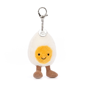adorably soft bag charm of a smiling egg with legs by popular brand Jellycat.