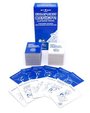 Blue card game box titled 'Kids Against Maturity' placed behind stacks of cards with different illustrations and text. The items are on a white background. 