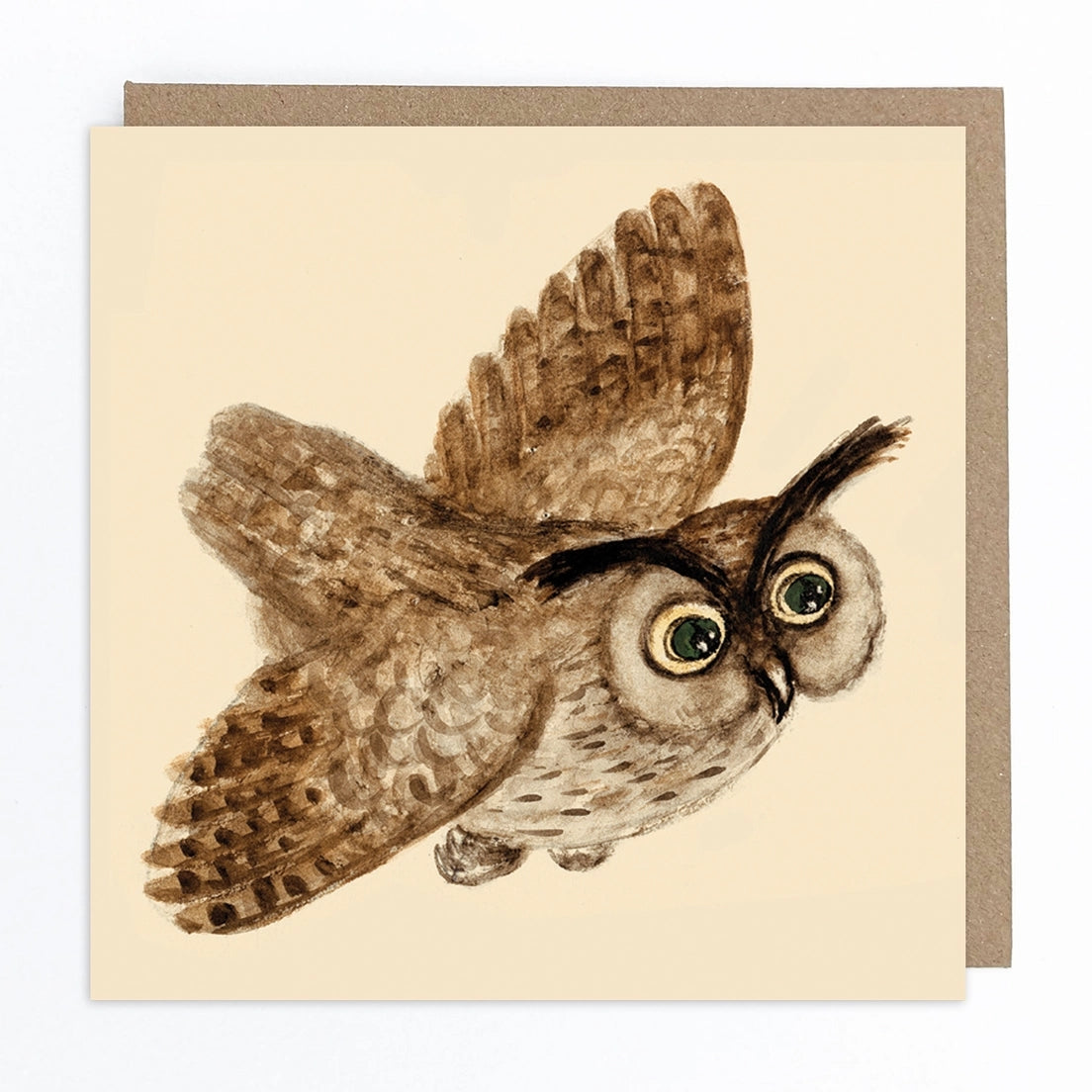 Card featuring an illustration of a brown owl flying on a cream coloured background. 