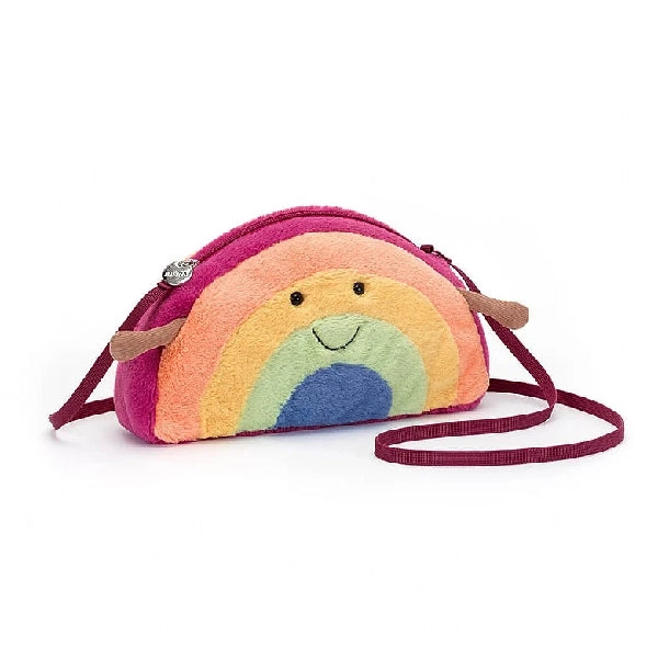 adorably soft plushie bag of a smiling rainbow with arms by popular brand Jellycat.