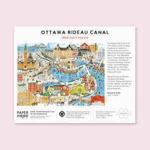Back view of a puzzle box featuring a colorful illustration of Ottawa's Rideau Canal along with the company's branding and some text.