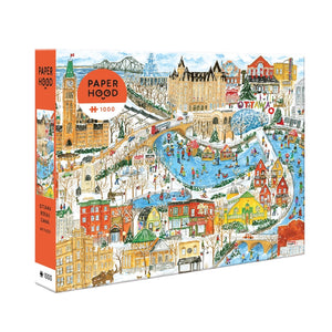 Puzzle box featuring a colorful illustration of Ottawa's Rideau Canal along with the company's branding.