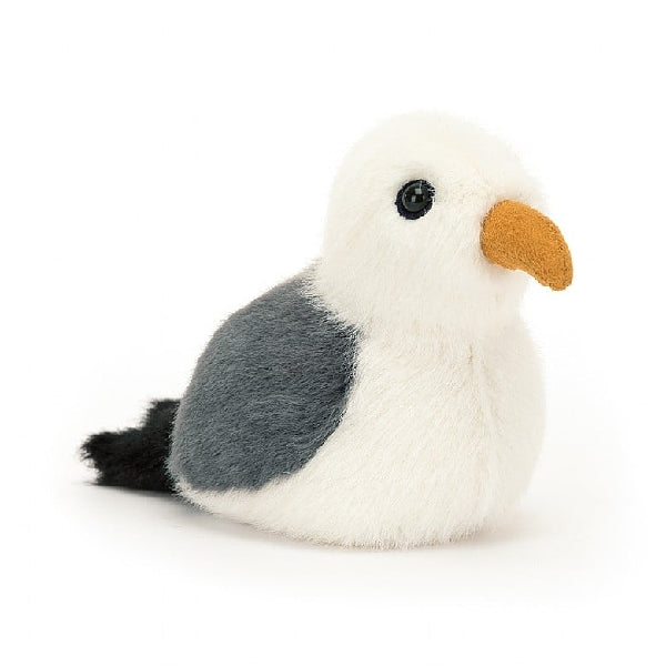 adorably soft plushie of a seagull birdling by popular brand Jellycat.
