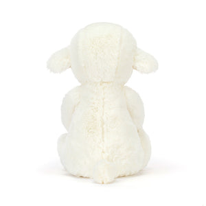 Back view of a white Jellycat lamb plush on a white background