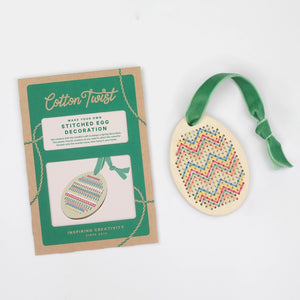 Cotton Twist stitched egg decoration with packaging on a white background.