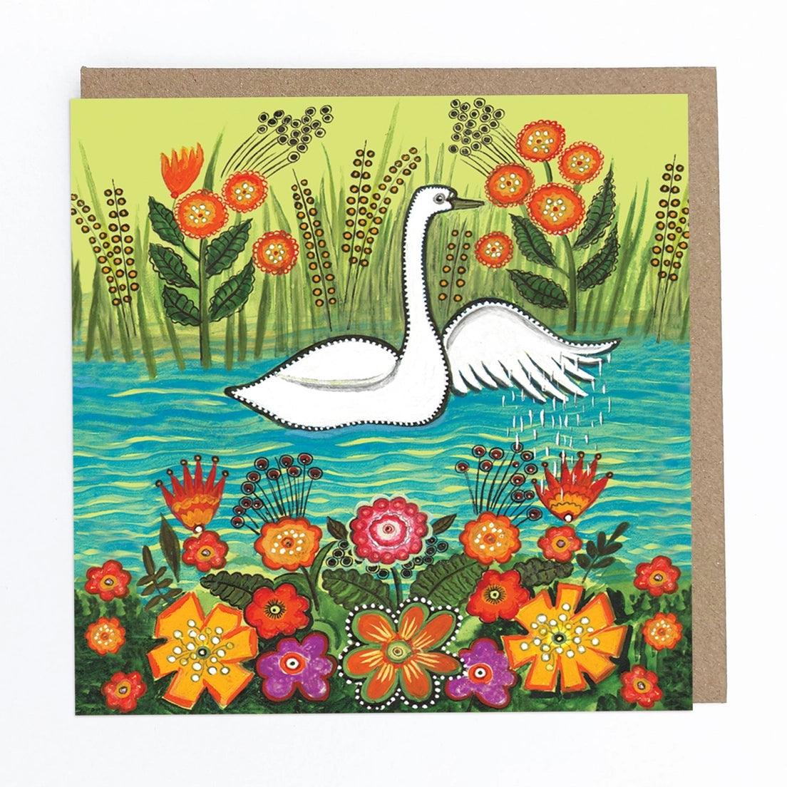 Greeting card with a folk art style illustration of a swan in water with some colorful flowers on a green background.
