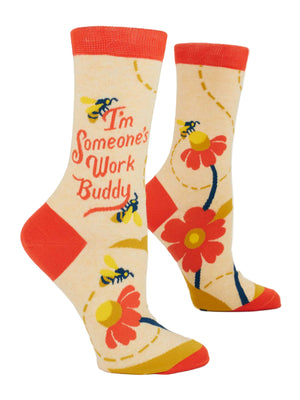 Colorful socks with text saying 'I'm someone's work buddy' showing images of wasps and floral designs on a white background
