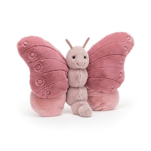 adorably soft plushie of a smiling pink butterfly by popular brand Jellycat.