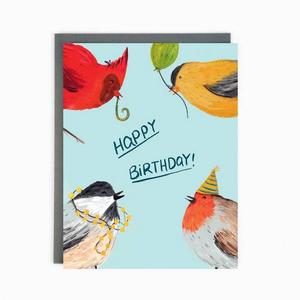 A colorful birthday card featuring an illustration of four party birds on a blue background with a 'Happy Birthday' message.
