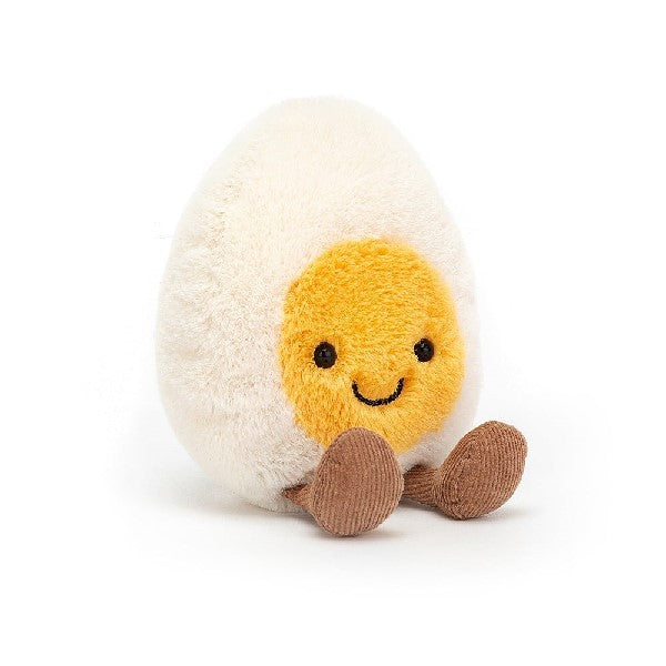 adorably soft plushie of a smiling boiled egg with legs by popular brand Jellycat.