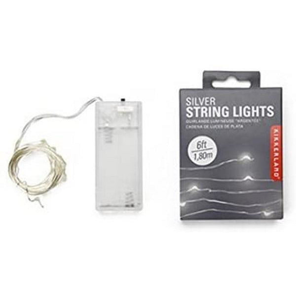 circle bundle of silver string lights connected to a battery pack. the kikkerland product is besides its grey packaging on a white background