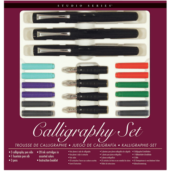 dark magenta box with clear window displaying calligraphy pens and ink tubes. bottom text reads "calligraphy set" and then details of the contents in english, french, spanish, and german