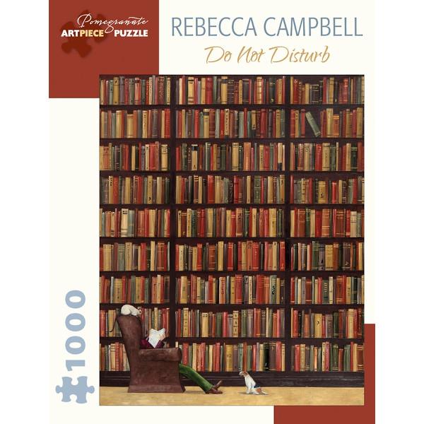 white puzzle box with brown accents. the centre of the box has an image of a person sitting in a chair in front of a comically large and filled bookcase 